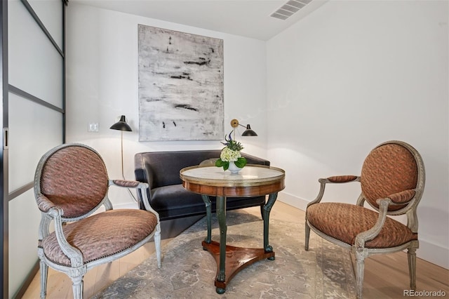 155 Steele St Unit 418, Denver, CO 80206 - living area featuring wood finished floors and baseboards