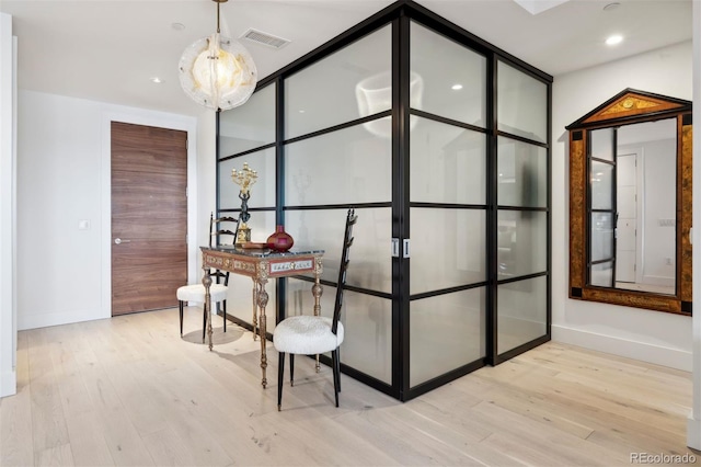 155 Steele St Unit 418, Denver, CO 80206 - hall featuring wood finished floors, baseboards, and recessed lighting