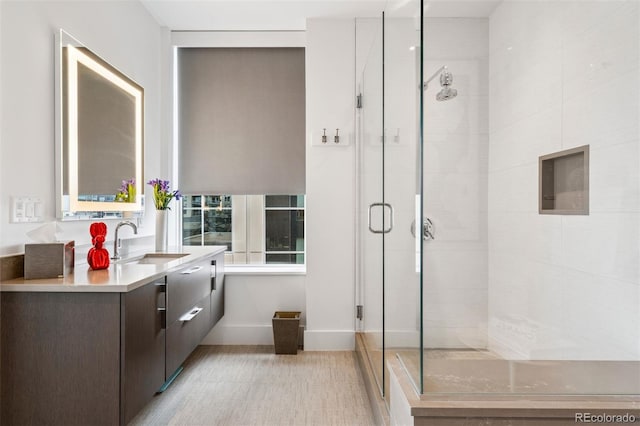 155 Steele St Unit 418, Denver, CO 80206 - bathroom featuring vanity and a shower stall