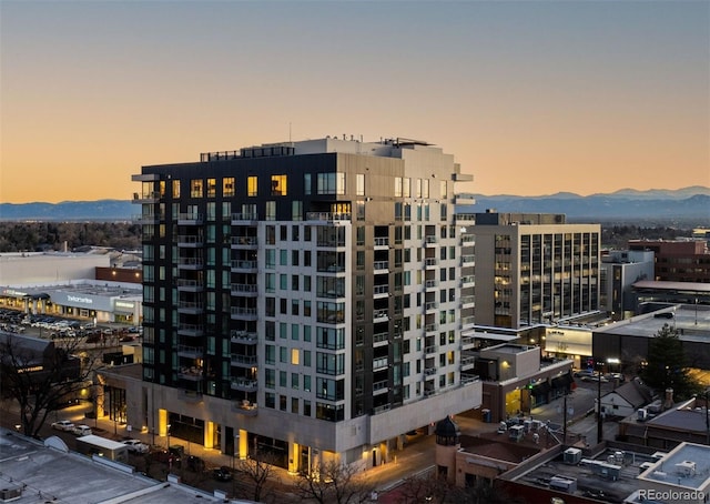 155 Steele St Unit 418, Denver, CO 80206 - property at dusk featuring a mountain view and a view of city