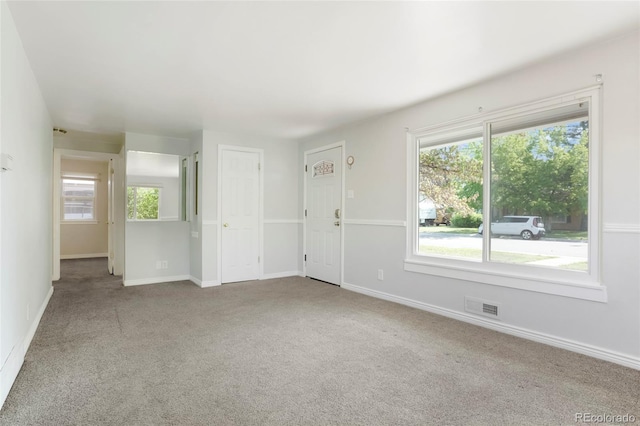5455 Dudley Ct, Arvada, CO 80002 - unfurnished room with carpet floors, plenty of natural light, and baseboards