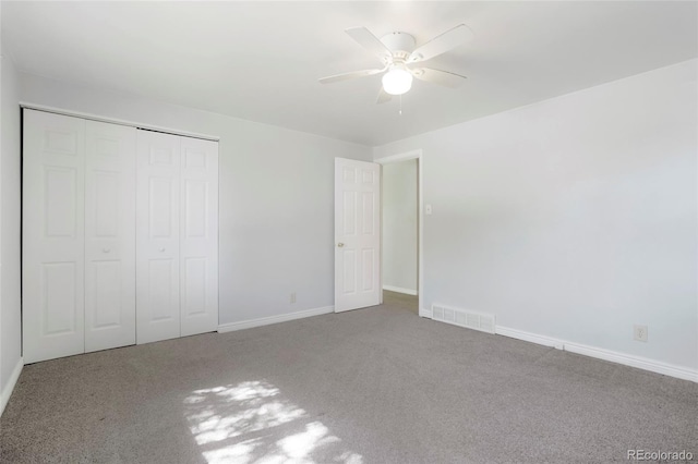 5455 Dudley Ct, Arvada, CO 80002 - unfurnished bedroom featuring carpet, a closet, baseboards, and a ceiling fan