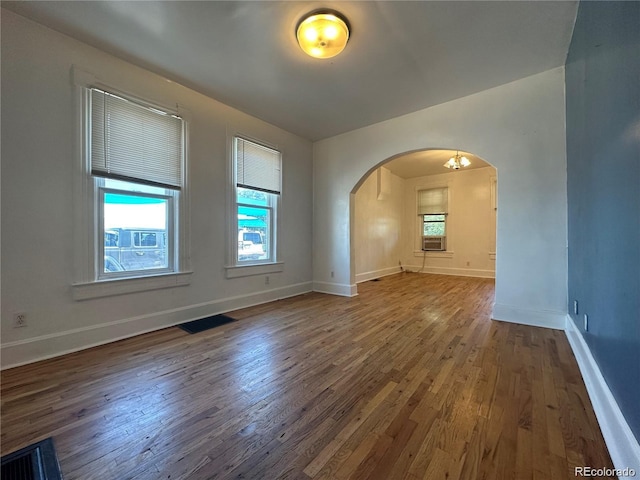 empty room with wood-type flooring