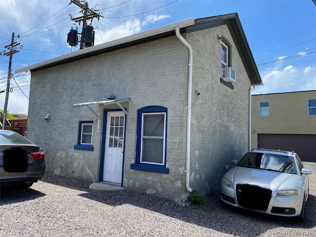 view of front of home featuring cooling unit