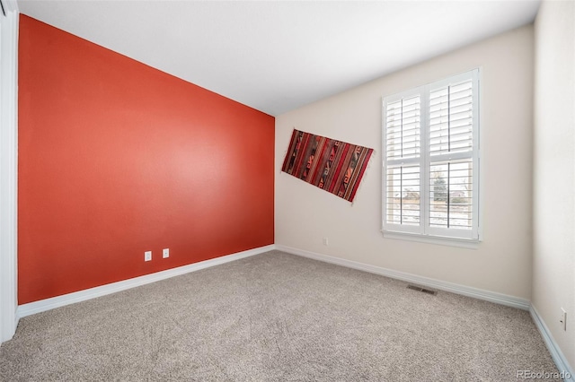 view of carpeted spare room