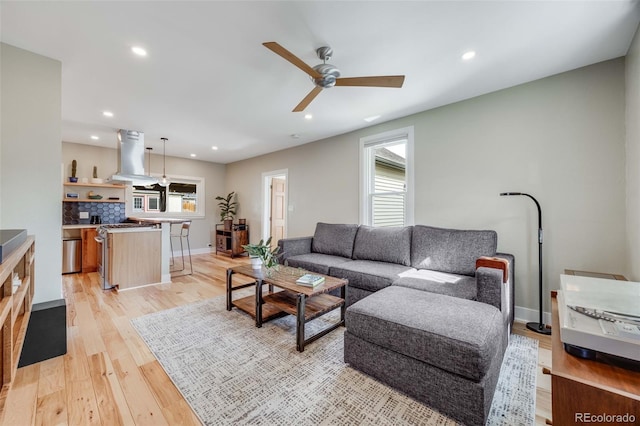 1055 Quartz St, Golden, CO 80401 - living area featuring ceiling fan, plenty of natural light, light wood-type flooring, recessed lighting, and baseboards