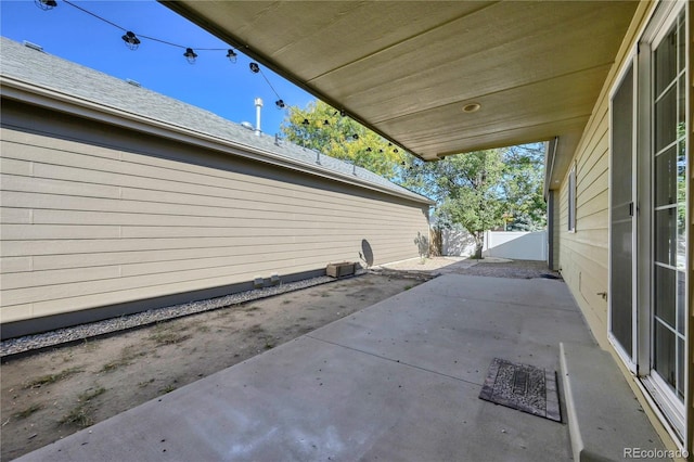 view of patio with fence