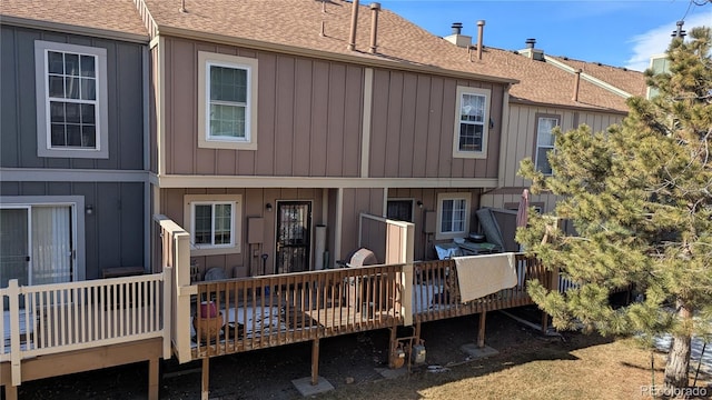 rear view of house with a deck