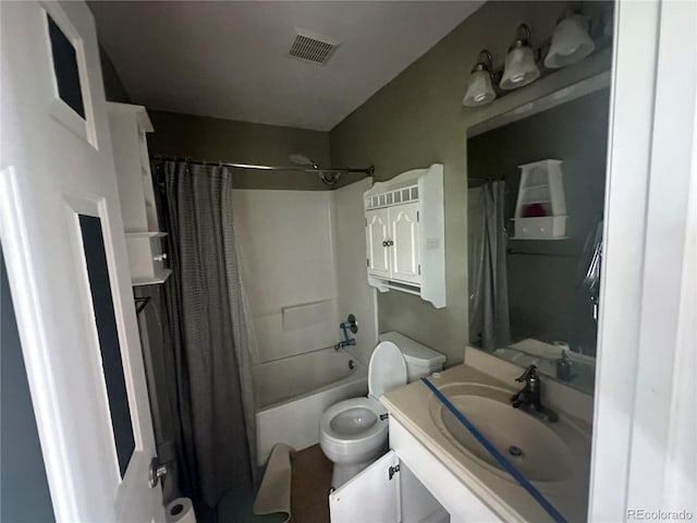 full bathroom with toilet, shower / tub combo with curtain, and vanity