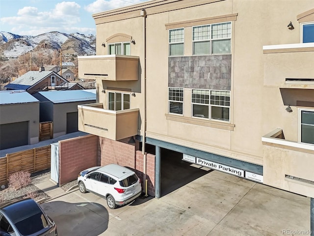 view of building exterior featuring a mountain view