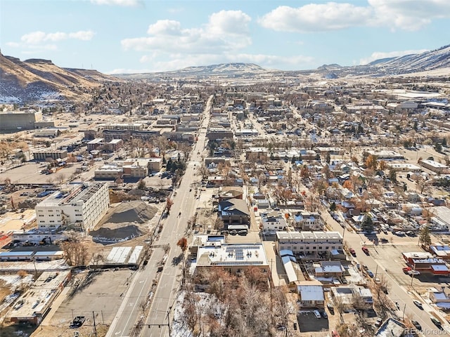 birds eye view of property with a mountain view