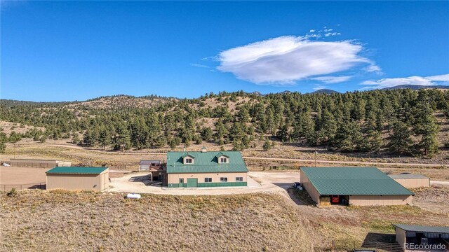 1120 County Road 322, Westcliffe, CO 81252 - view of mountain backdrop with a heavily wooded area