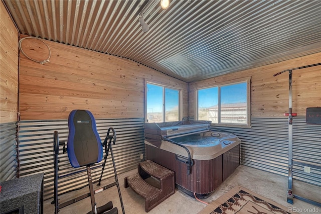 1120 County Road 322, Westcliffe, CO 81252 - miscellaneous room featuring wooden walls and concrete flooring