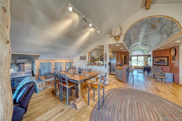 1120 County Road 322, Westcliffe, CO 81252 - dining space featuring rail lighting and hardwood / wood-style floors