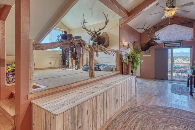 1120 County Road 322, Westcliffe, CO 81252 - corridor with lofted ceiling and hardwood / wood-style floors