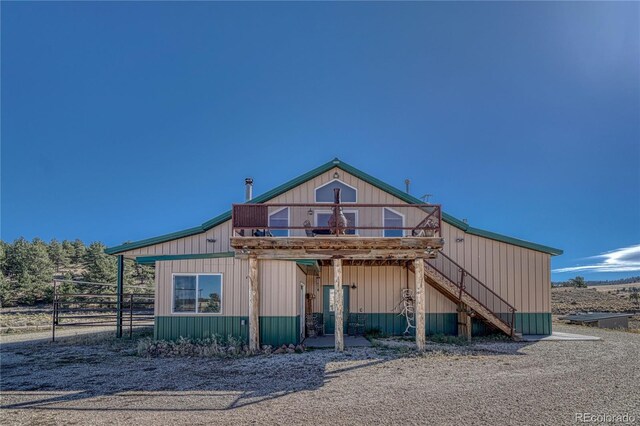 1120 County Road 322, Westcliffe, CO 81252 - view of front of home with a deck and stairs