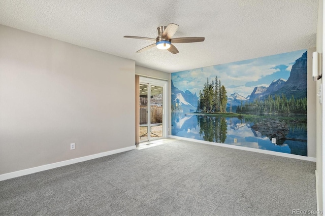 unfurnished room with baseboards, carpet, ceiling fan, and a textured ceiling