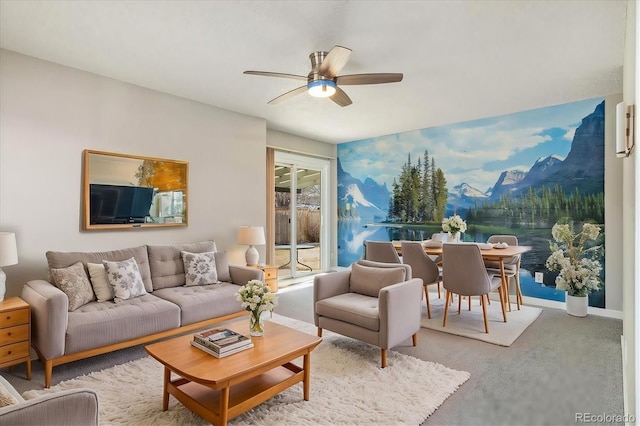 living room featuring baseboards, wallpapered walls, ceiling fan, and carpet floors
