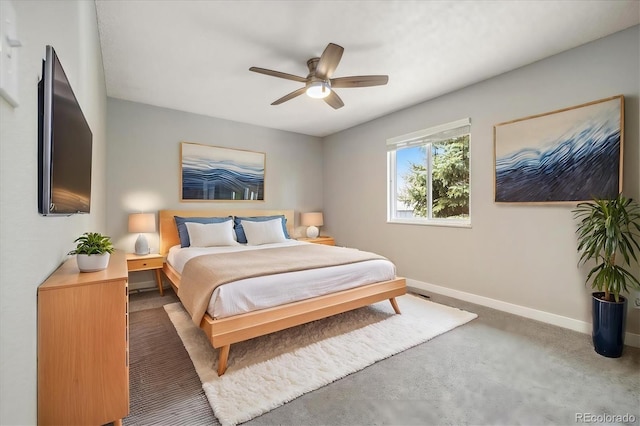 bedroom featuring a ceiling fan and baseboards