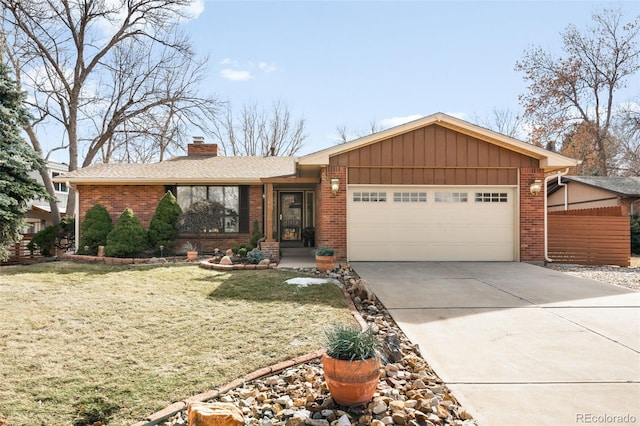 ranch-style house with concrete driveway, brick siding, an attached garage, and a front yard