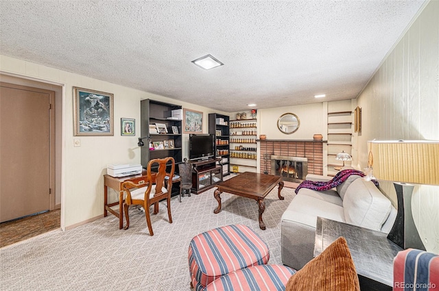 living room featuring a textured ceiling, a fireplace, and carpet flooring