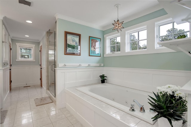 bathroom with tile patterned floors, crown molding, and shower with separate bathtub