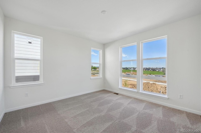 1257 Rhett Dr, Erie, CO 80026 - carpeted empty room featuring baseboards
