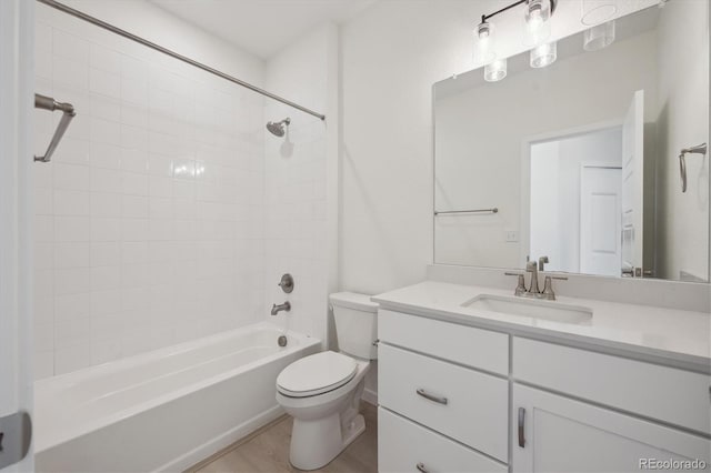 1257 Rhett Dr, Erie, CO 80026 - full bathroom with toilet, vanity, and  shower combination