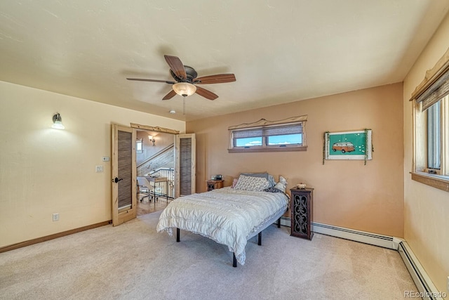 12220 Saddle Ridge Ln, Salida, CO 81201 - carpeted bedroom with a baseboard radiator, ceiling fan, and baseboards
