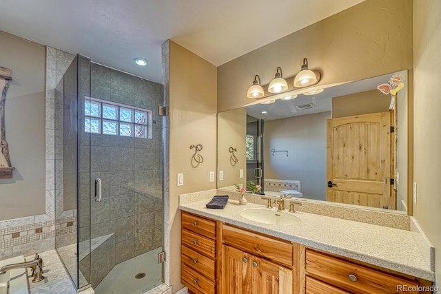 12220 Saddle Ridge Ln, Salida, CO 81201 - bathroom featuring a shower stall and vanity
