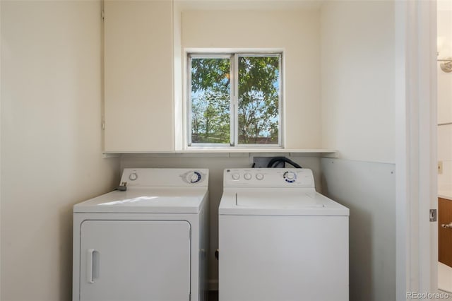 laundry room featuring washer and clothes dryer