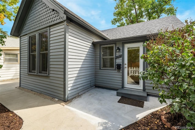 property entrance with a patio