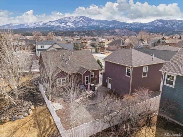 bird's eye view featuring a residential view and a mountain view