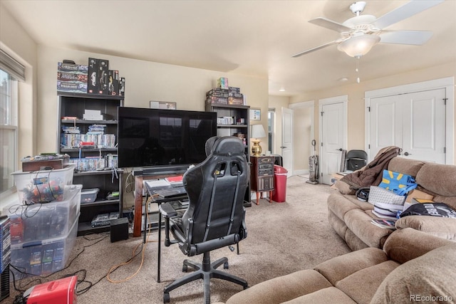 carpeted office with ceiling fan