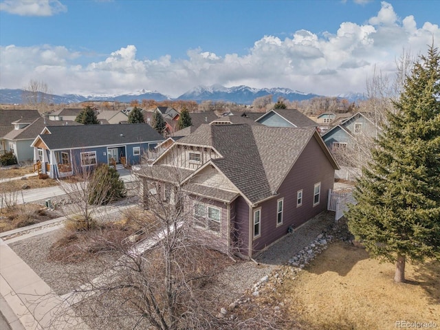 bird's eye view with a mountain view and a residential view