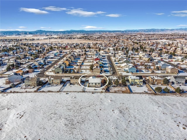 bird's eye view featuring a mountain view and a residential view