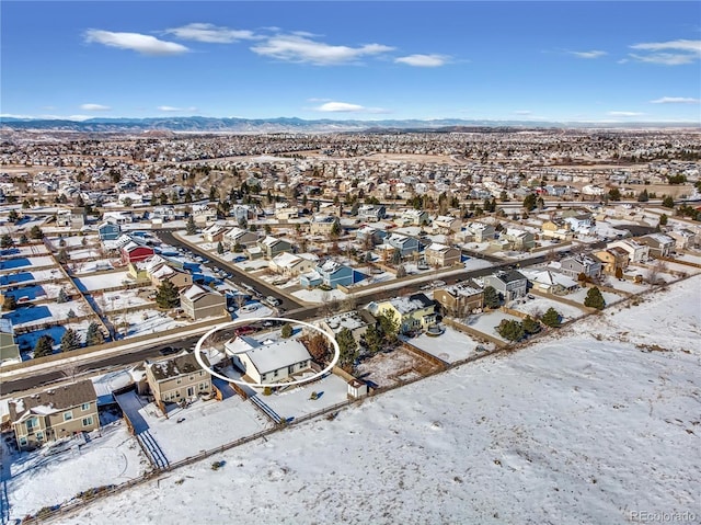 aerial view featuring a mountain view and a residential view