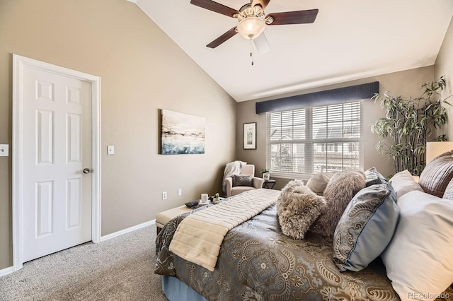 carpeted bedroom with baseboards, a ceiling fan, and vaulted ceiling