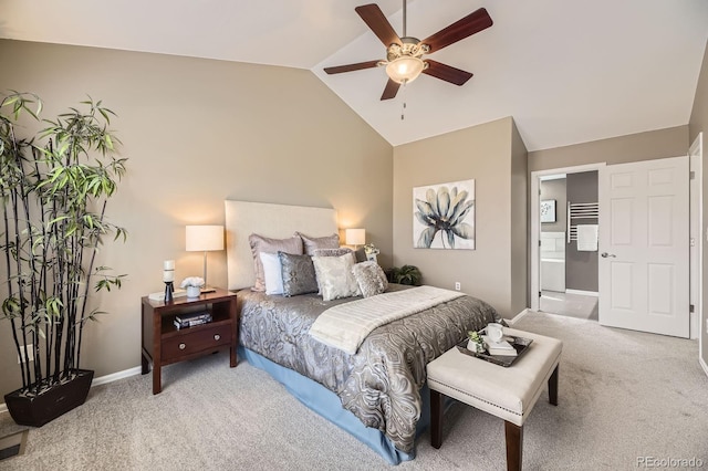 bedroom featuring lofted ceiling, ensuite bathroom, carpet floors, baseboards, and ceiling fan