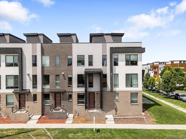 3103 W 18th Ave, Denver, CO 80204 - view of front of house featuring brick siding and stucco siding