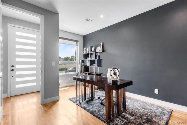 3103 W 18th Ave, Denver, CO 80204 - home office featuring light wood-type flooring and baseboards