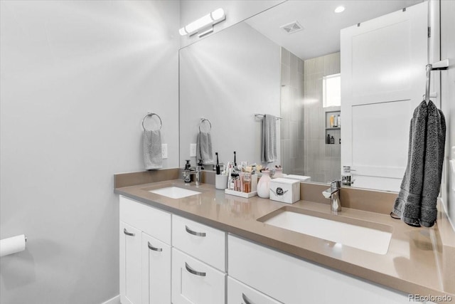 3103 W 18th Ave, Denver, CO 80204 - bathroom with double vanity and recessed lighting