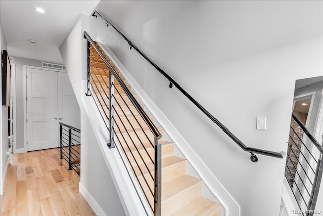 3103 W 18th Ave, Denver, CO 80204 - staircase featuring wood finished floors and baseboards