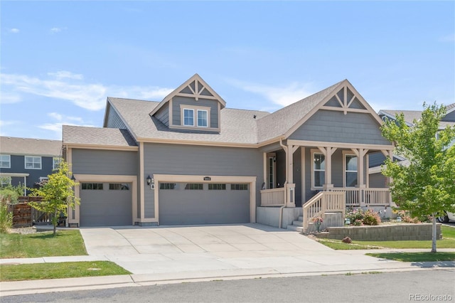 9904 Quintero St, Commerce City, CO 80022 - view of front of home featuring a garage, concrete driveway, a shingled roof, and covered porch