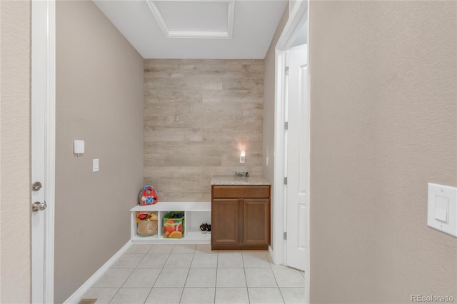 9904 Quintero St, Commerce City, CO 80022 - laundry room with light tile patterned floors and baseboards