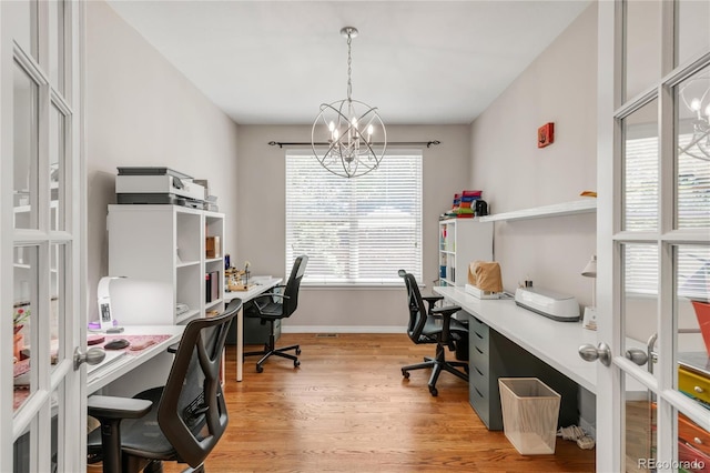9904 Quintero St, Commerce City, CO 80022 - office space with light wood-type flooring and a chandelier
