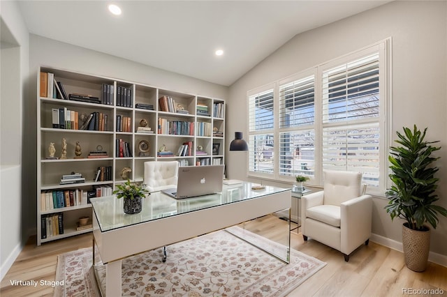 office with light wood finished floors, recessed lighting, baseboards, and vaulted ceiling