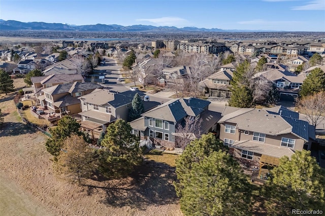 drone / aerial view with a mountain view and a residential view