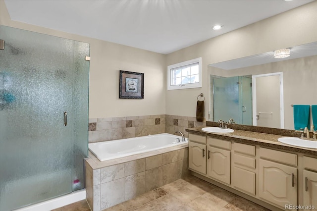 bathroom with vanity, tile patterned floors, and independent shower and bath