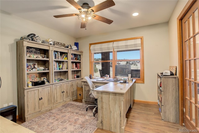 office area with recessed lighting, baseboards, light wood-style floors, and a ceiling fan